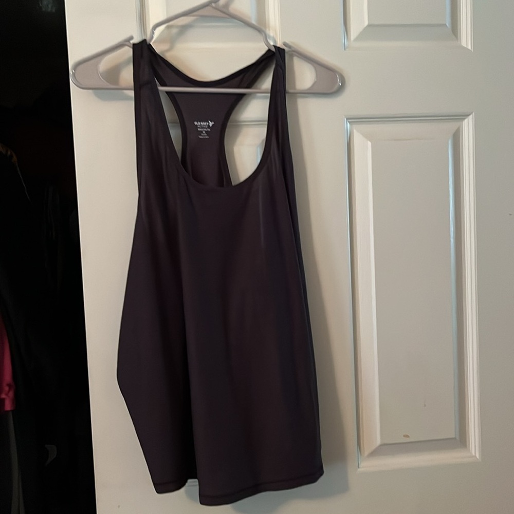 T back black work out shirt or in my case whatever I felt like wearing it for.